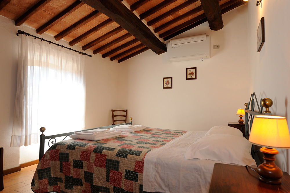 Отель Relais Borgo Torale Пассиньяно-суль-Тразимено Экстерьер фото