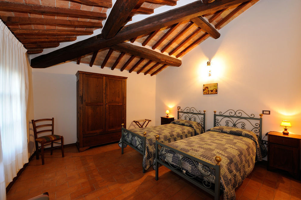 Отель Relais Borgo Torale Пассиньяно-суль-Тразимено Экстерьер фото